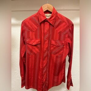 Classic vintage long sleeve Wrangler snap shirt in deep red stripes.